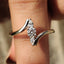 Bypass Engagement Ring With Round And Pear Diamond