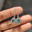 Oval Cut Earrings In Halo Style