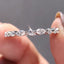Marquise And Round Wedding Band Featuring Floating Bubble