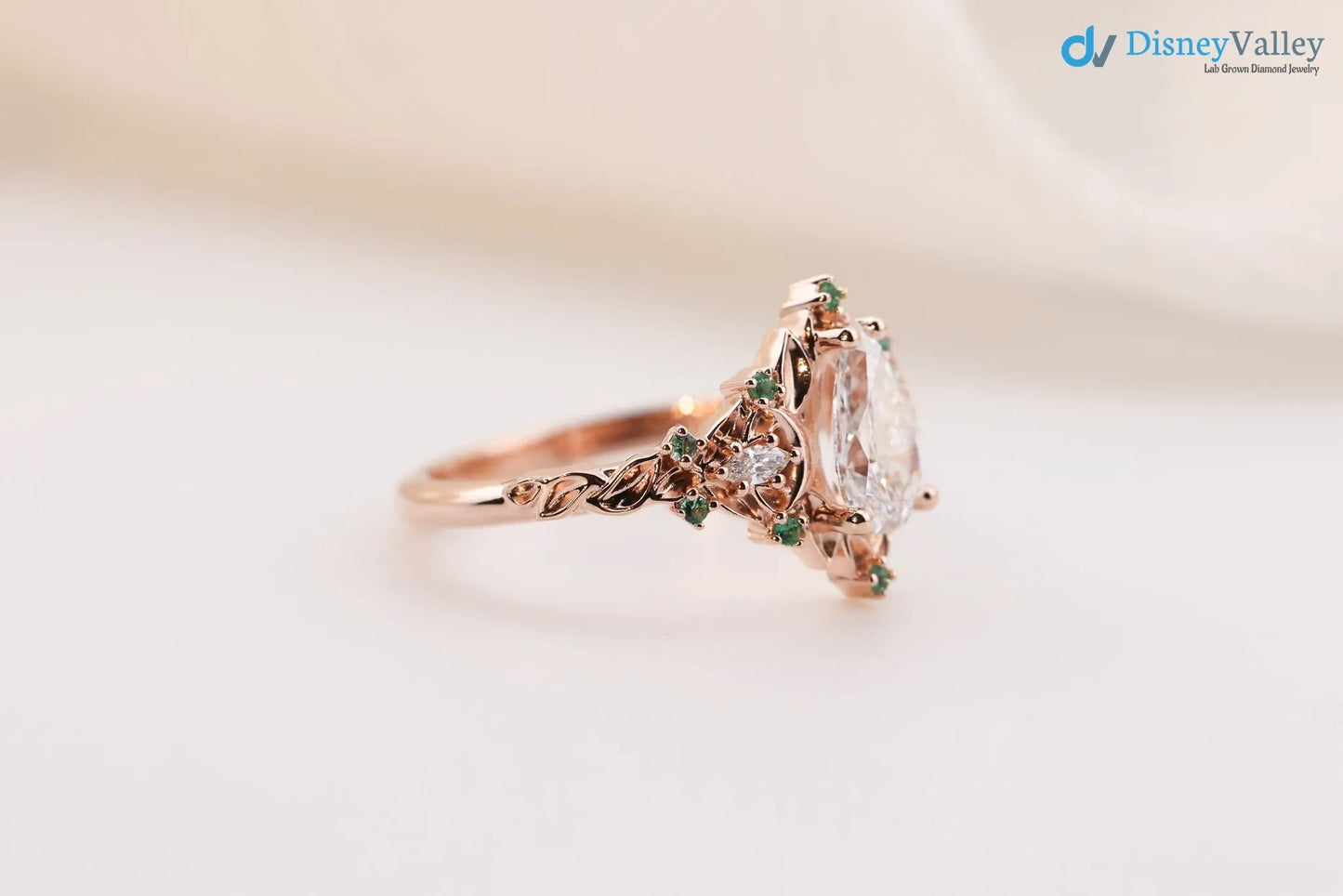2 caret pear center lab grown with Briar moon three stone rings DisneyValley