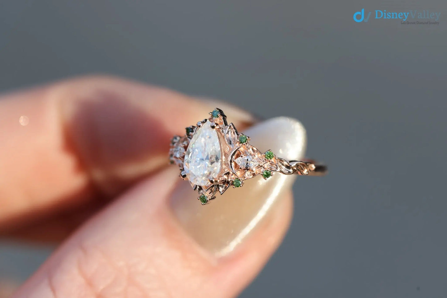 2 caret pear center lab grown with Briar moon three stone rings DisneyValley