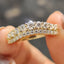 Curved wedding band yellow gold In Round Cut Moissanite