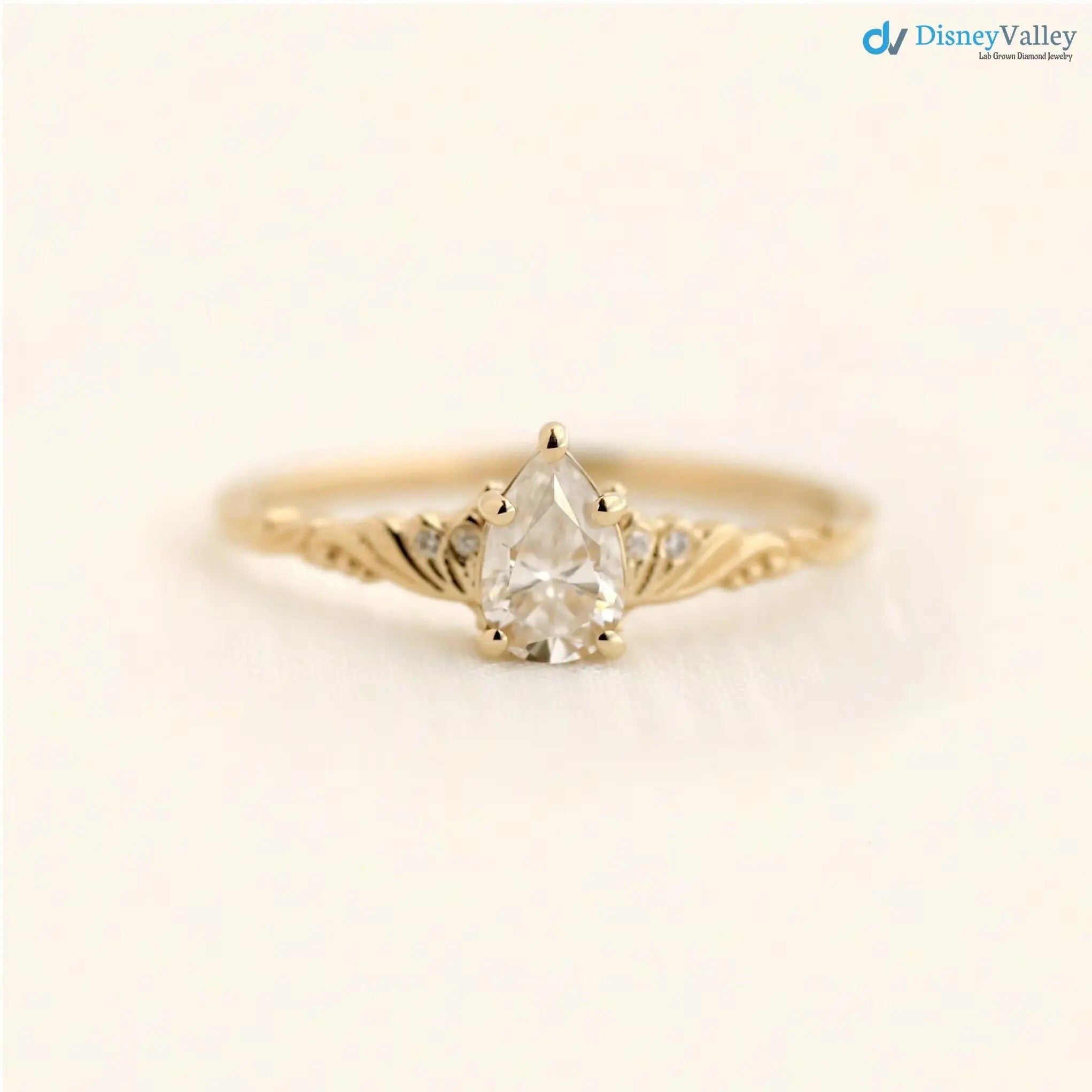 Foliate engagement ring, wedding solitaire pear cut diamond vintage leaf ring DisneyValley