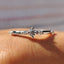 Delicate Distance Pave Wedding Band In Round Cut Moissanite