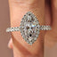Marquise Diamond Ring With Round Cut Halo Pave Setting