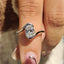 Oval Diamond Engagement Ring In Half Bezel Setting