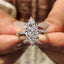 Marquise Cut Engagement Ring With Twisted Pave Band