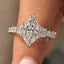 Dutch Marquise Ring With Trapezoid and Princess Side Stone