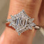 Elongated Hexagon Engagement Ring in Cluster Setting