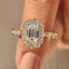 Emerald Cut Diamond Ring in Round Diamond Halo Style