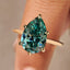 Cyan Blue Pear Cut Moissanite Ring in Solitaire Style