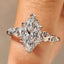 Marquise Cut Diamond Ring in Side Stone Style