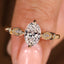 Oval Cut Diamond Ring With Round Side Stone Style