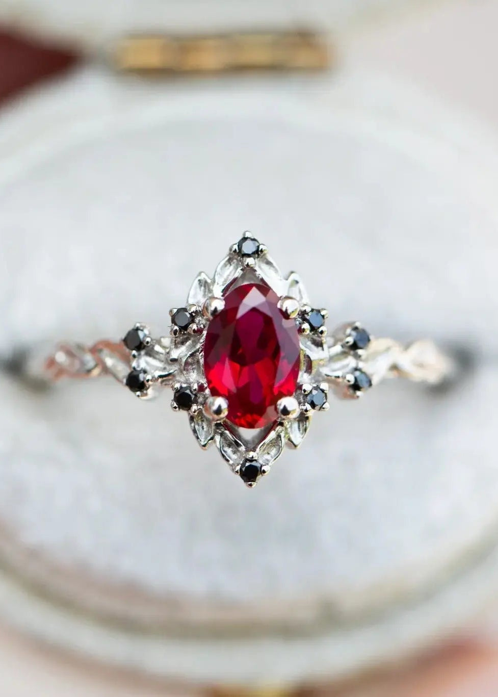rose halo with oval lab grown ruby and black diamonds wedding ring DisneyValley