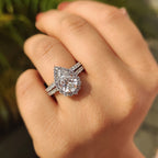 Pear Shaped Halo Engagement Ring In Round Cut Halo Style