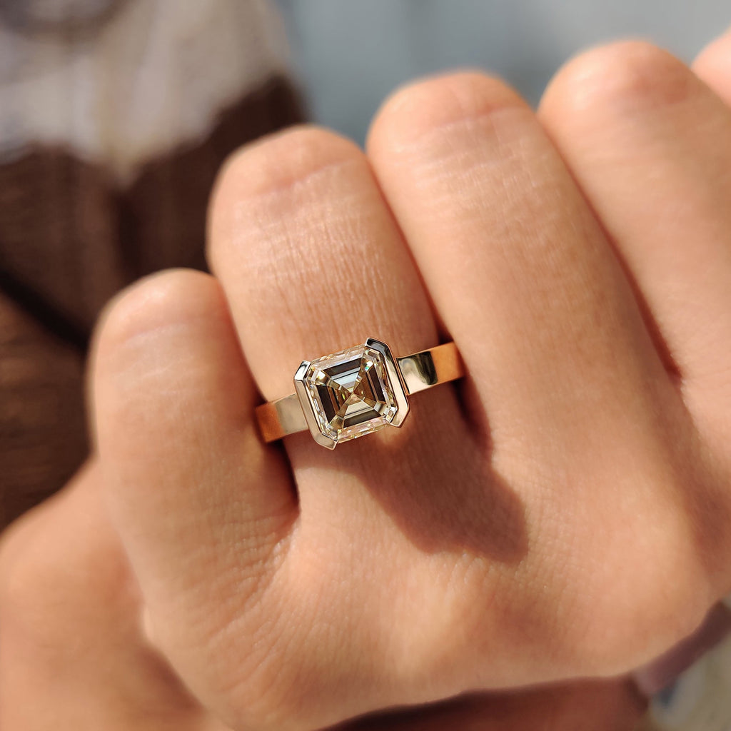 Asscher cut engagement ring in semi bezel setting