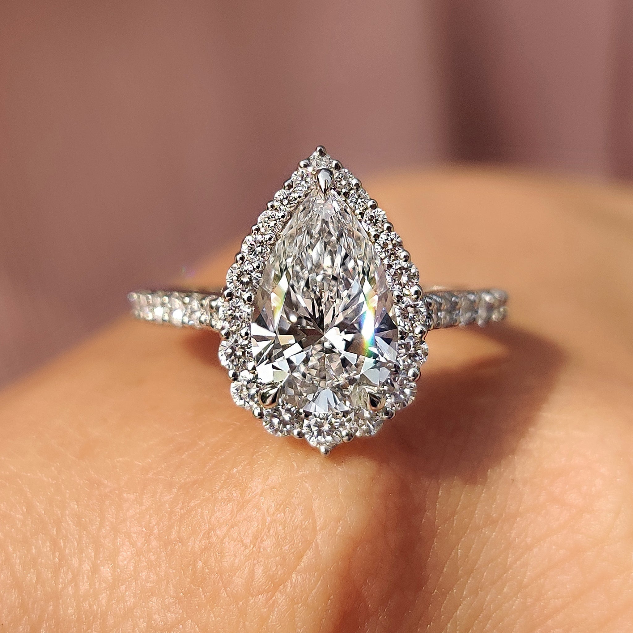 Pear Shaped Halo Engagement Ring In Round Cut Halo Style Main image