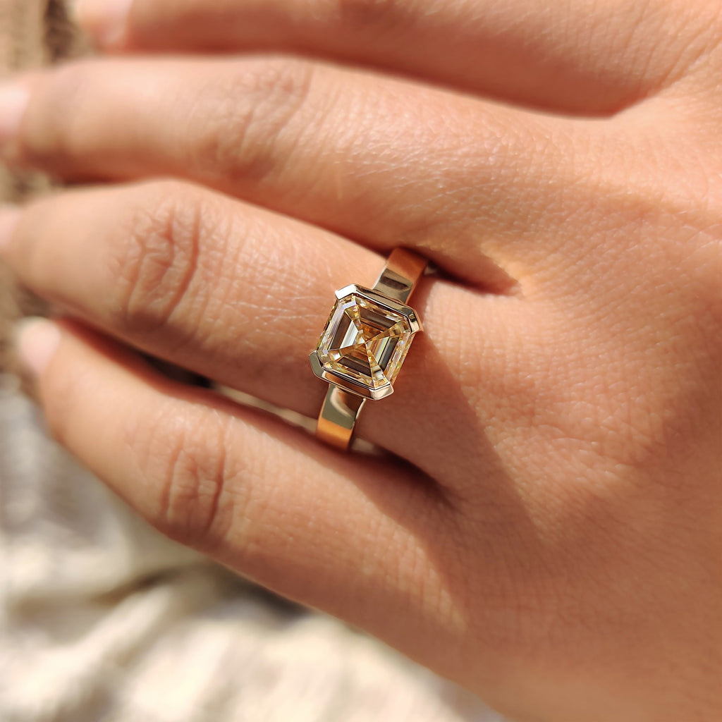 Asscher cut engagement ring in semi bezel setting