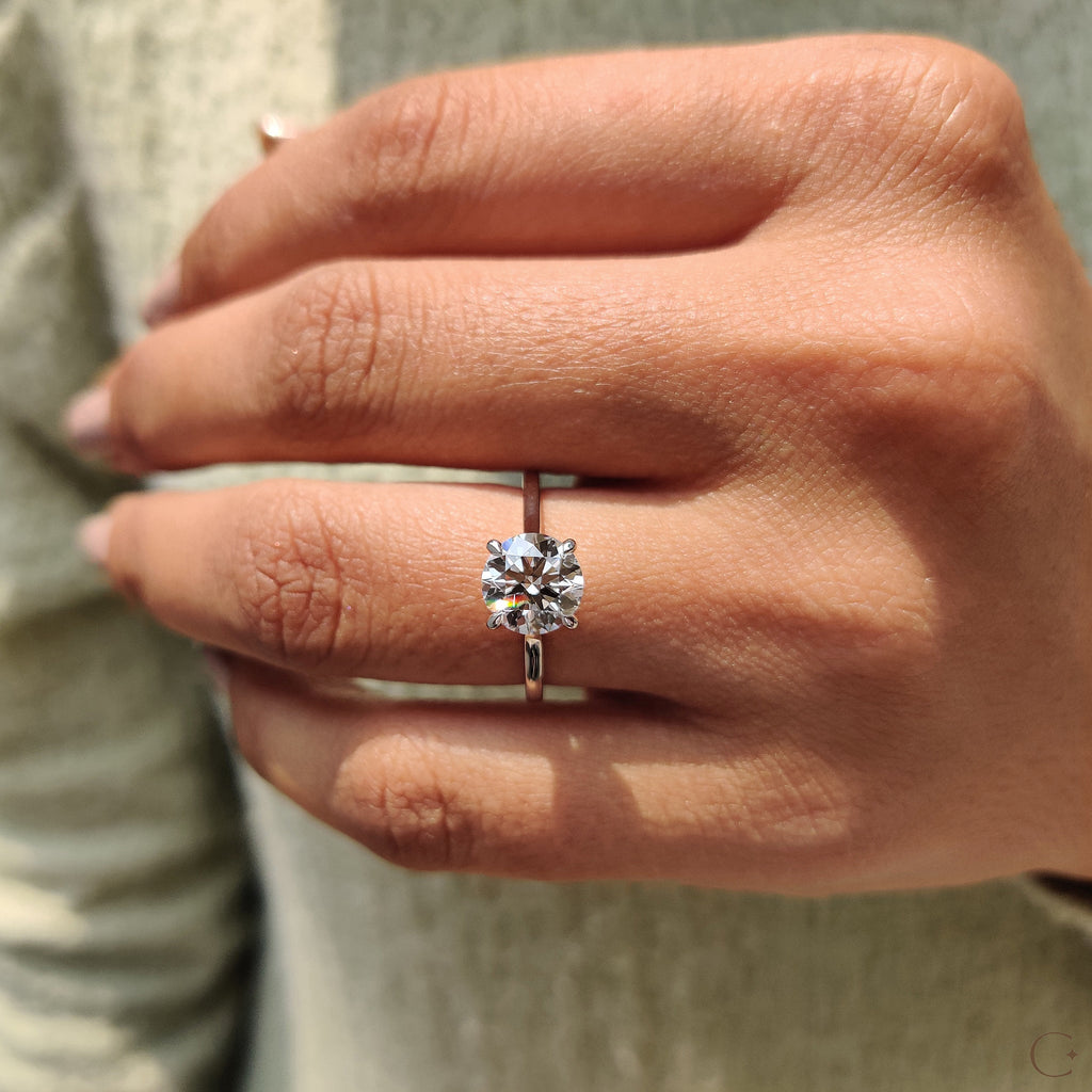 Cathedral Style Round Solitaire Diamond Ring