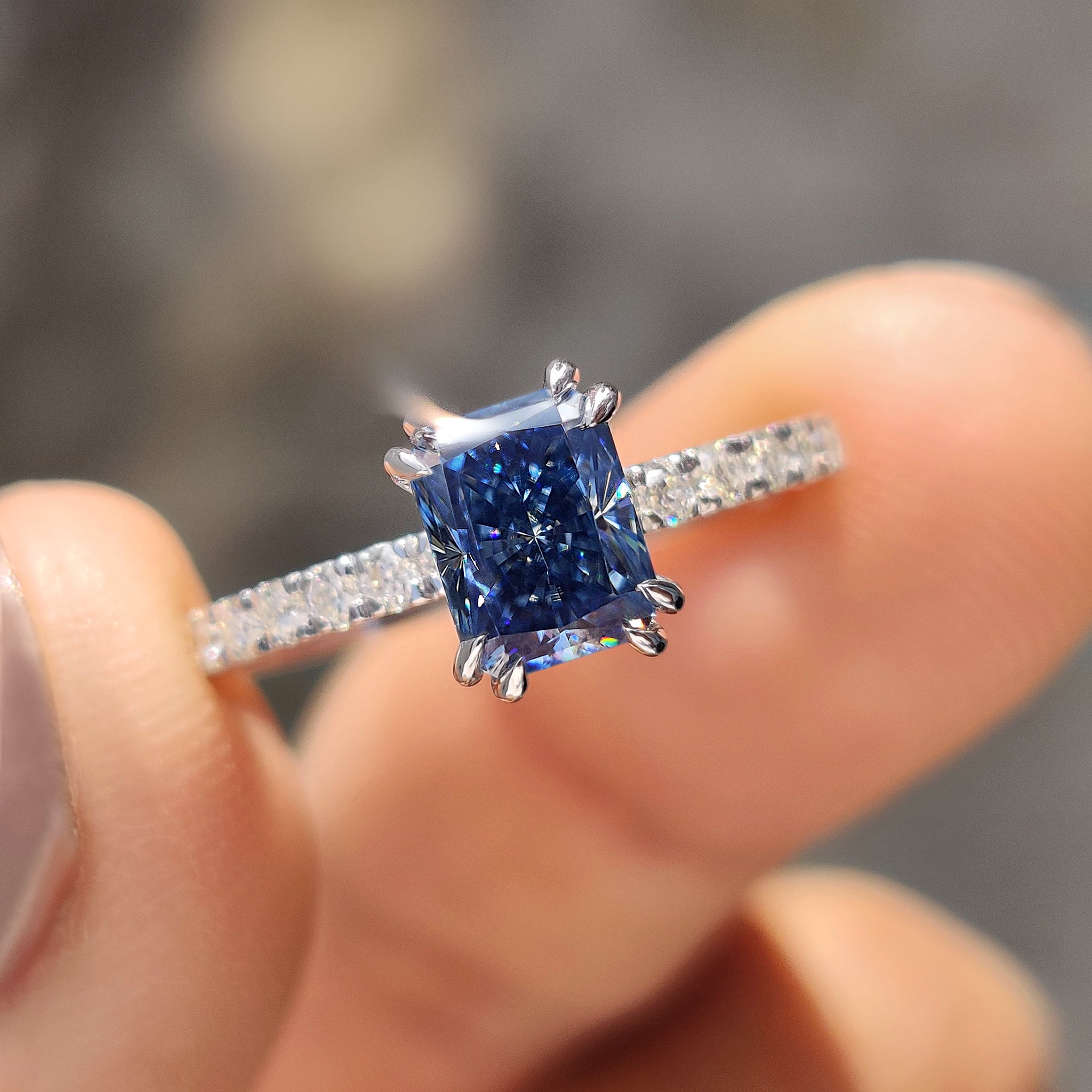 Radiant Cut Blue Moissanite Ring In Pave Setting Main image