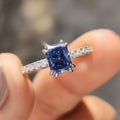 Radiant Cut Blue Moissanite Ring In Pave Setting