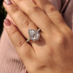 Pear Shaped Halo Engagement Ring In Round Cut Halo Style