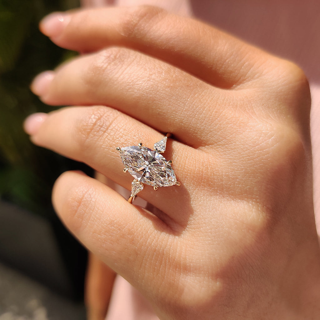 3 Stone Marquise Diamond Ring With Kite Side Stone