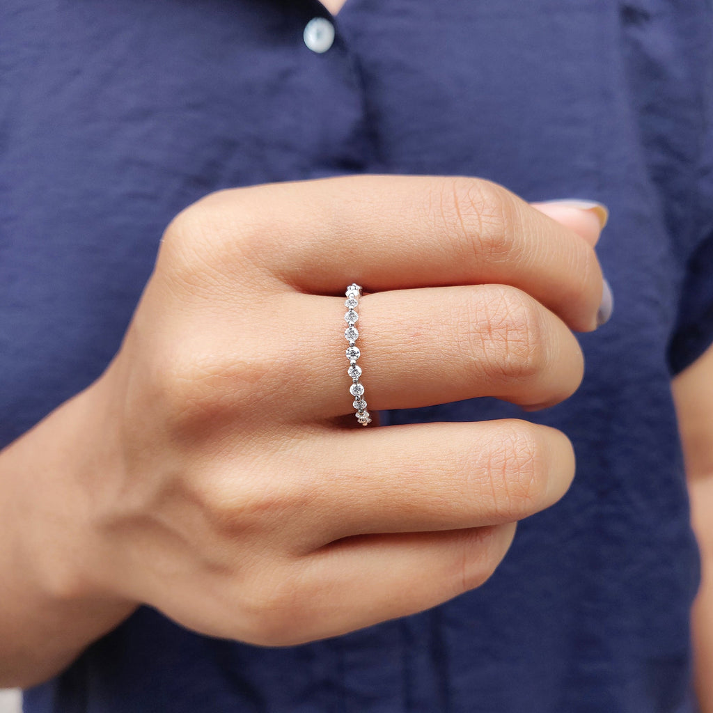 White Gold Wedding Band In Round Cut Moissanite