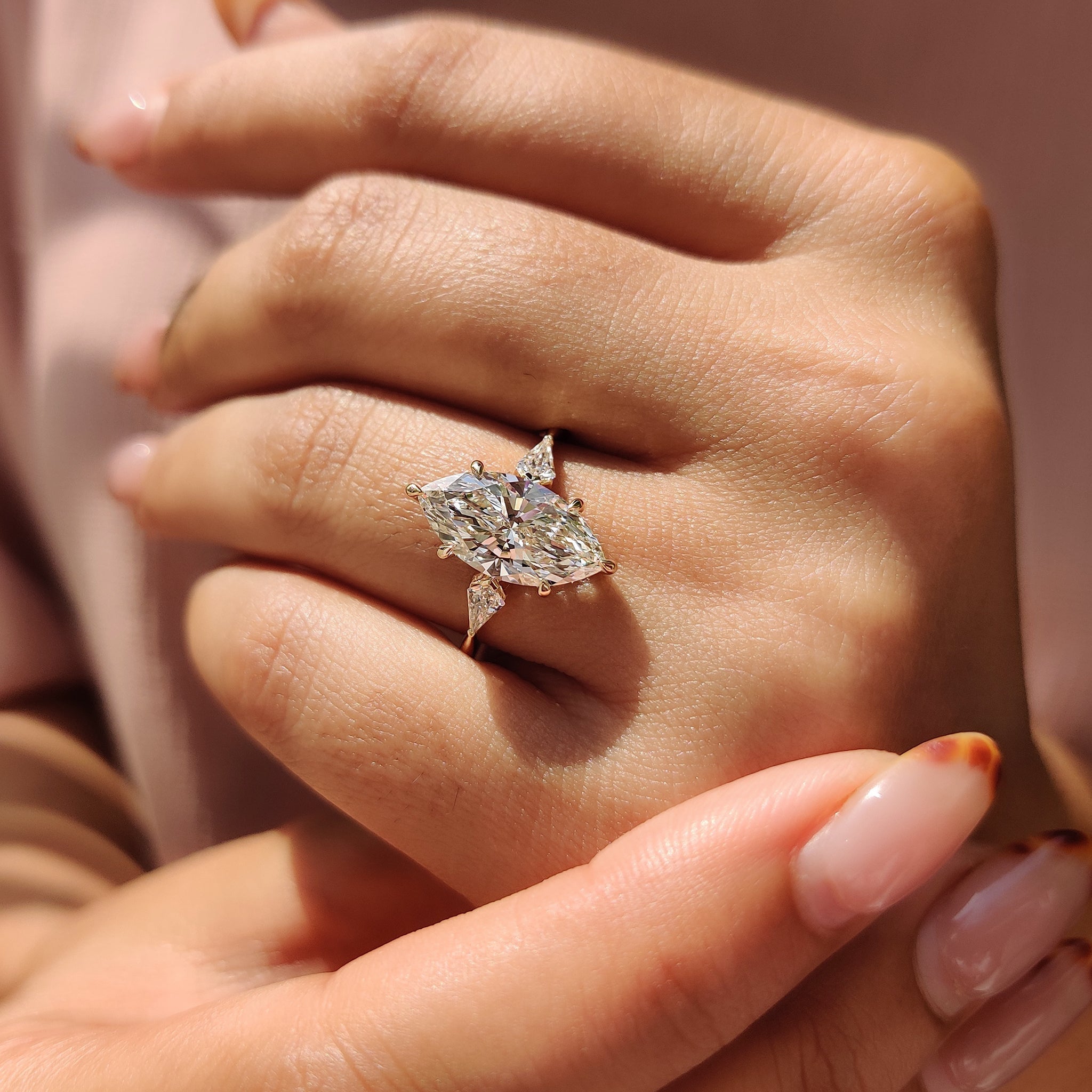3 Stone Marquise Diamond Ring With Kite Side Stone