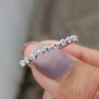 White Gold Wedding Band In Round Cut Moissanite
