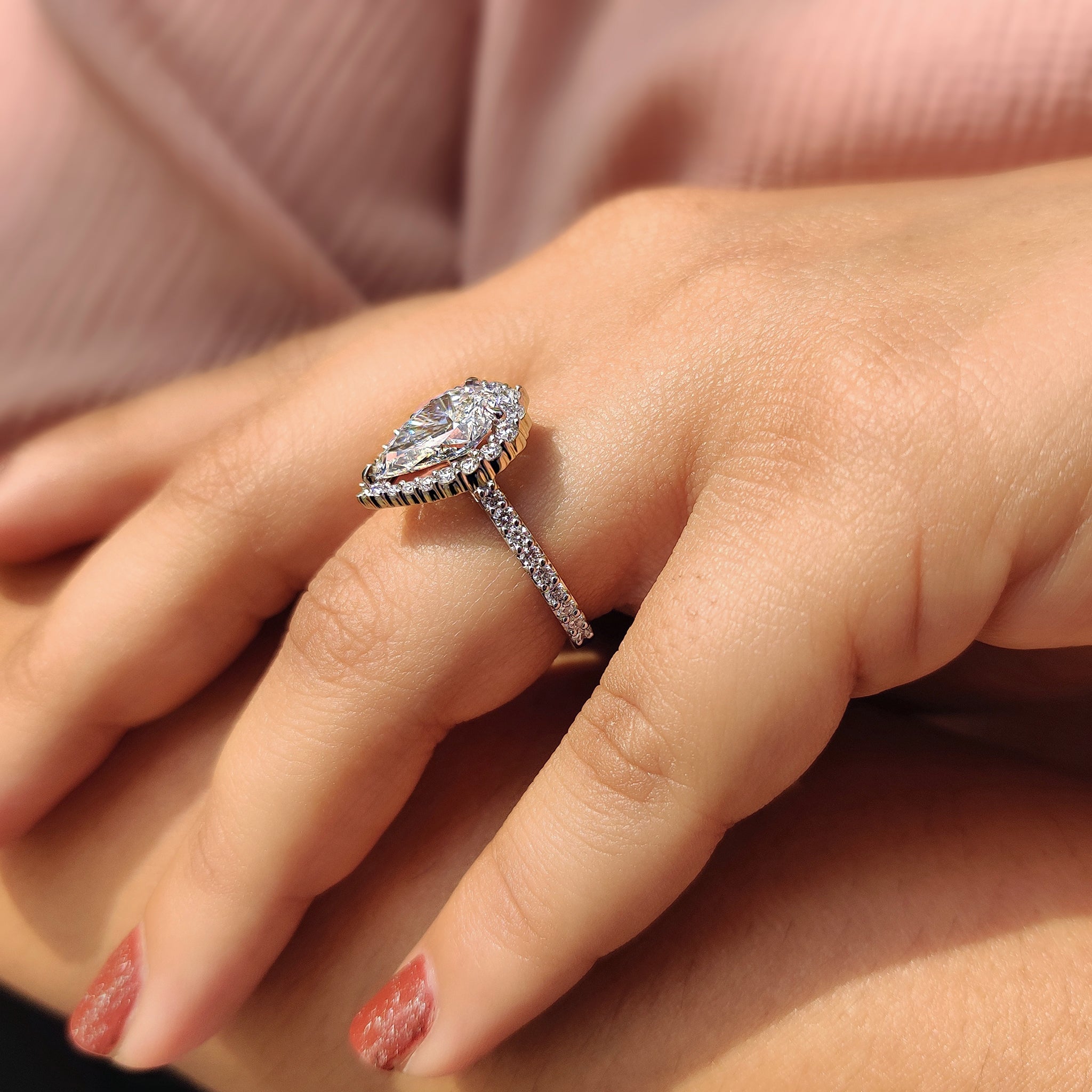 Pear Shaped Halo Engagement Ring In Round Cut Halo Style