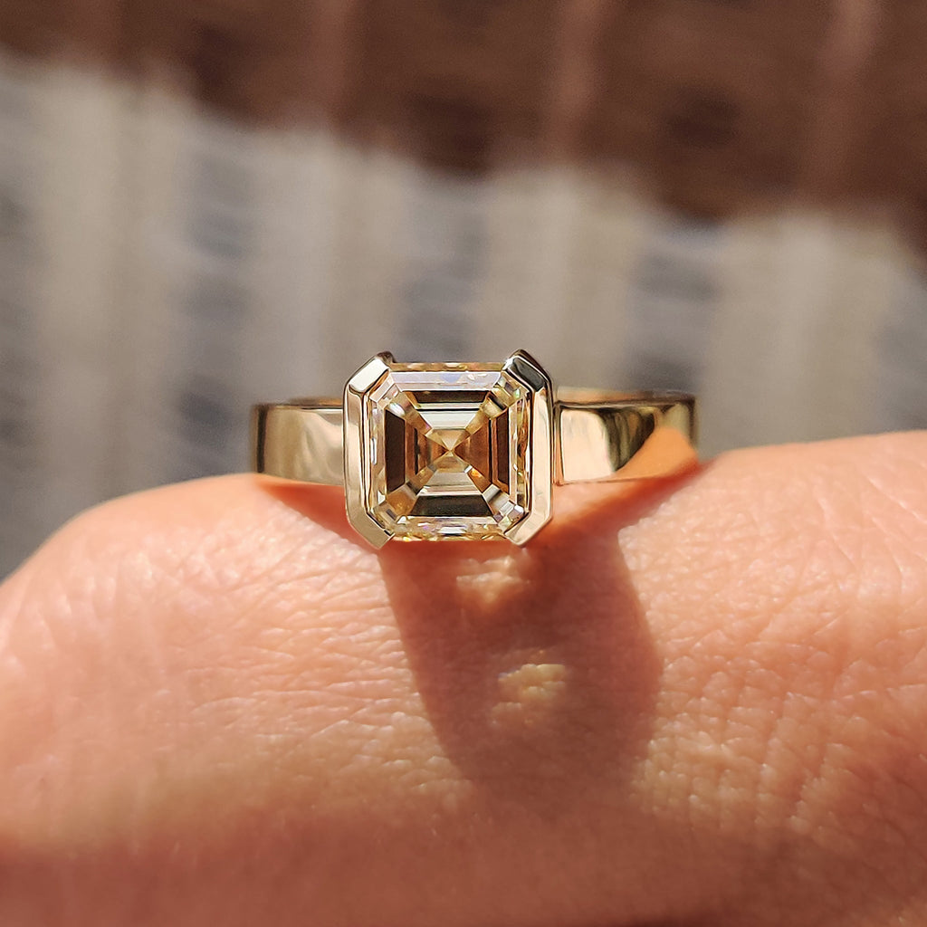 Asscher cut engagement ring in semi bezel setting