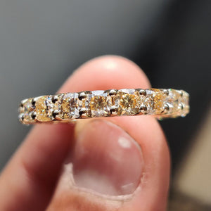Light Yellow Cushion Cut Trellis Eternity Band