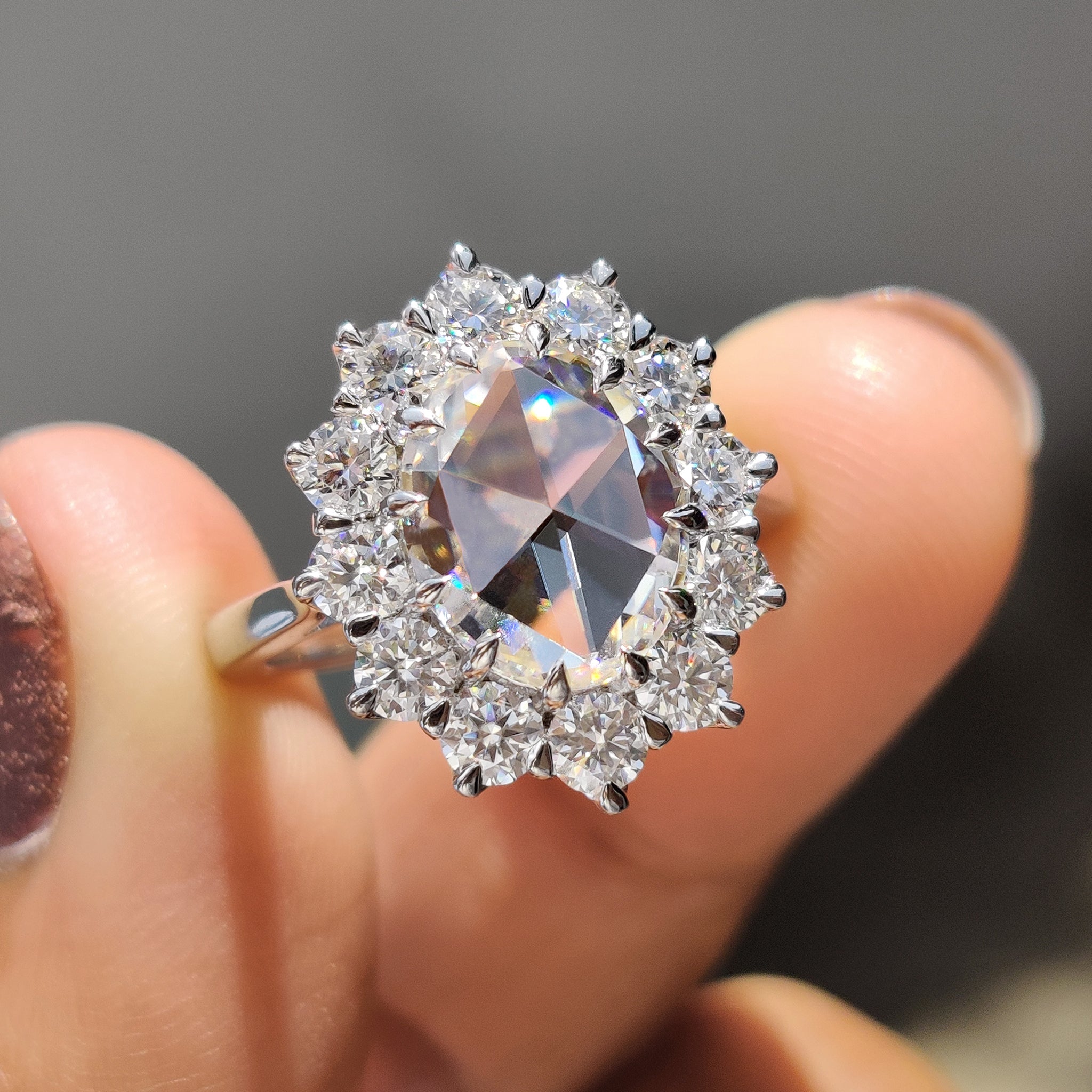 Oval Rose Cut Engagement Ring In Cluster Halo Style Main image