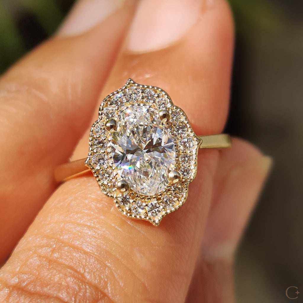 Oval Shaped Engagement Ring In Halo Milgrain Style