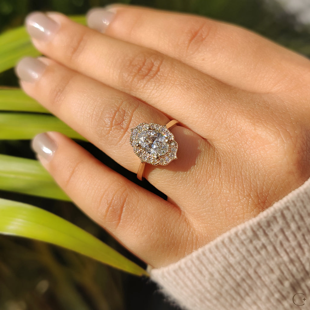 Oval Shaped Engagement Ring In Halo Milgrain Style