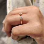 2 Stone Engagement Ring Featuring Emerald and Pear Cut