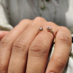 2 Stone Engagement Ring Featuring Emerald and Pear Cut