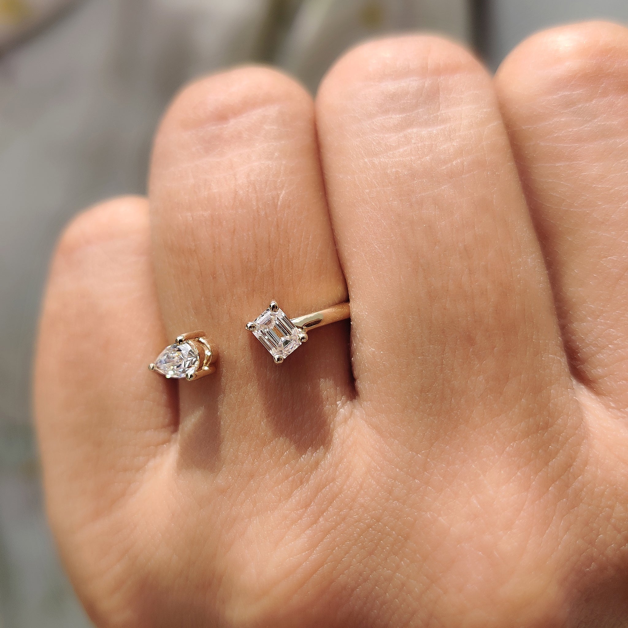 2 Stone Engagement Ring Featuring Emerald and Pear Cut
