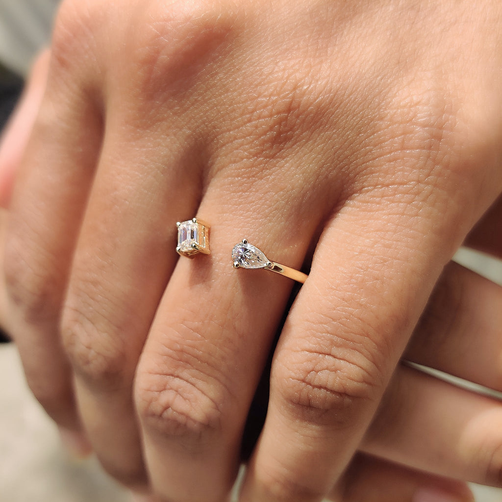2 Stone Engagement Ring Featuring Emerald and Pear Cut