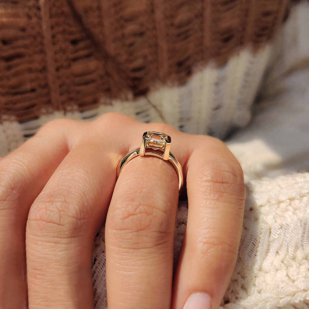 Asscher cut engagement ring in semi bezel setting