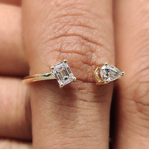 2 Stone Engagement Ring Featuring Emerald and Pear Cut