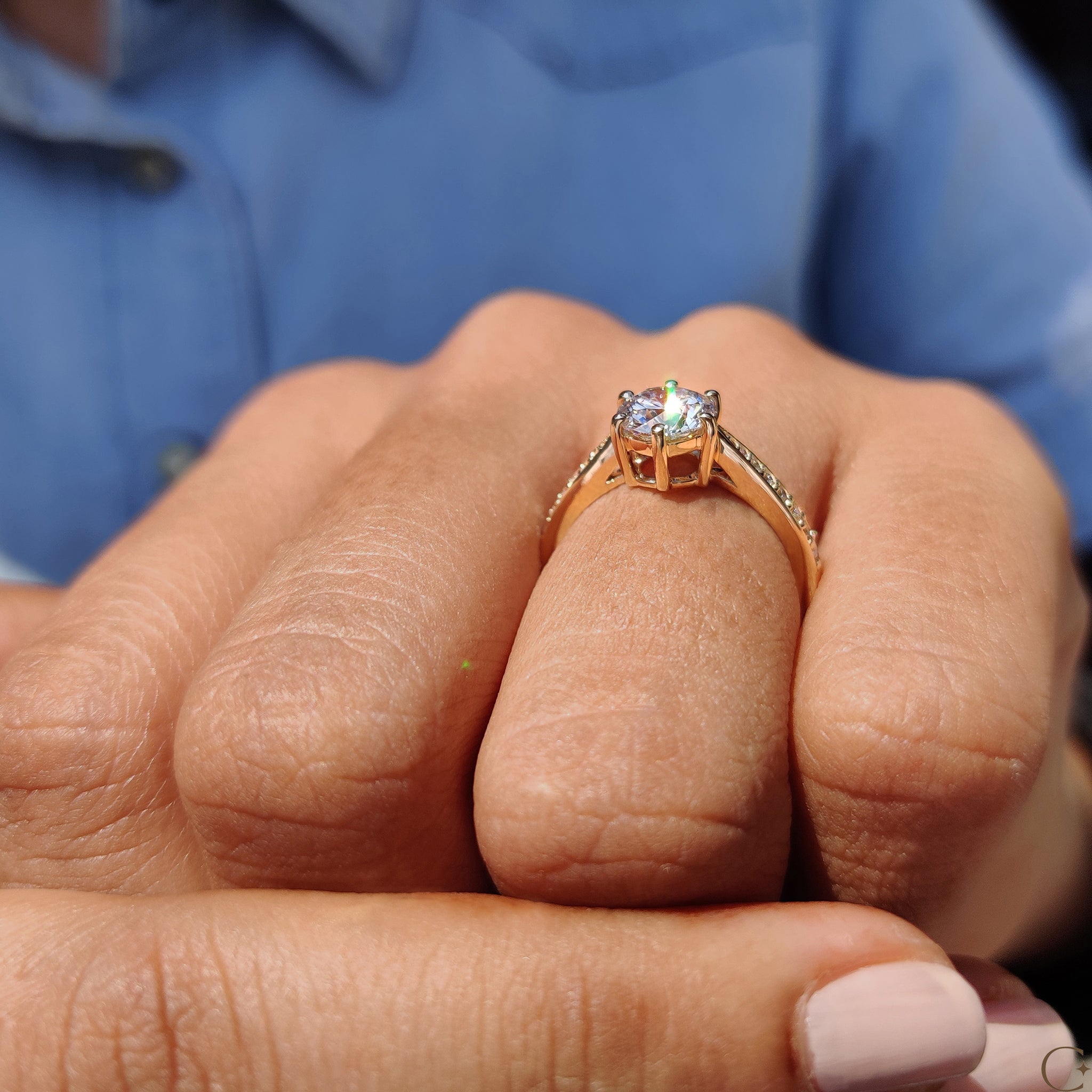 Round Cut Engagement Ring with Tapered Pave Setting