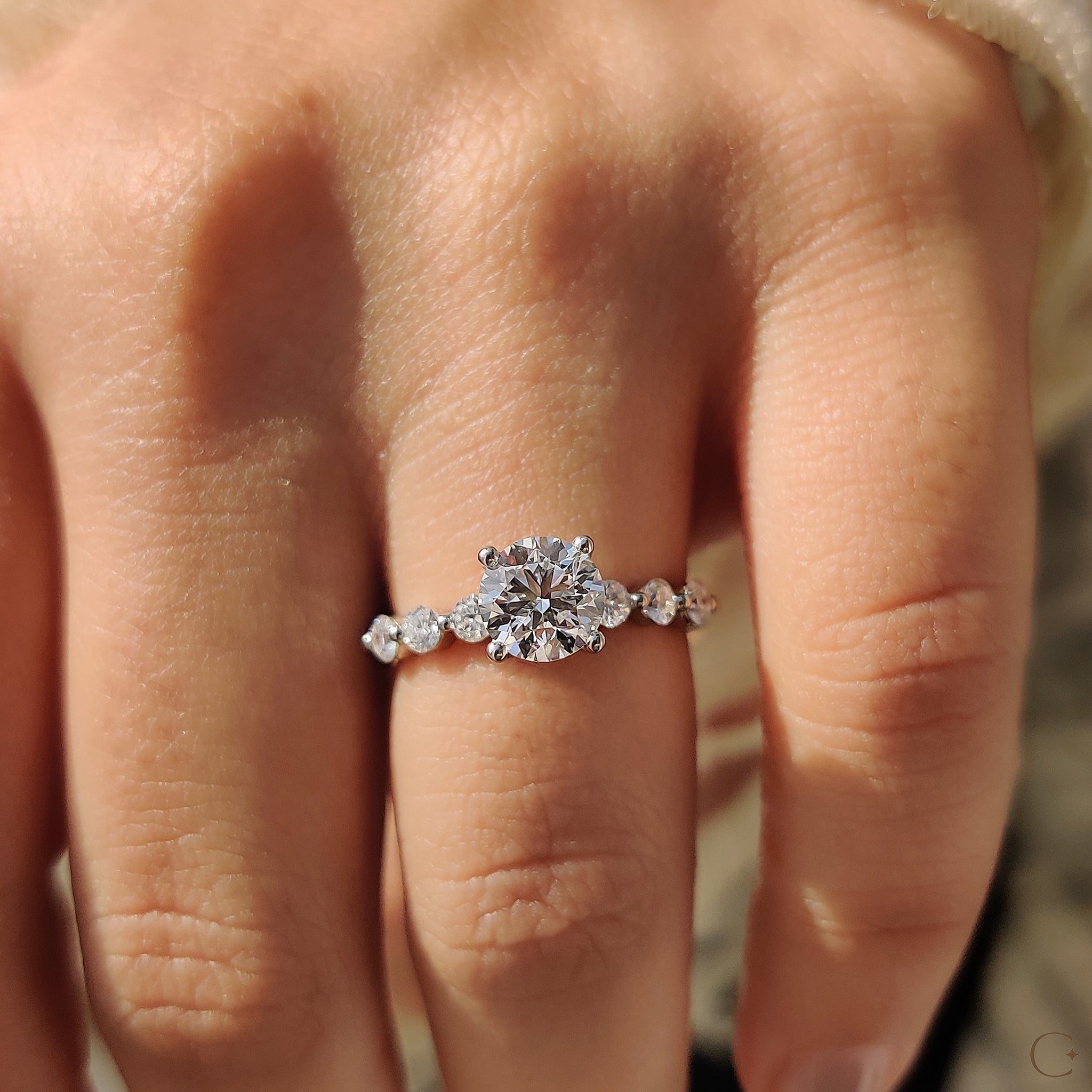 Round Brilliant Cut Diamond Ring With Round Cut Side Stones
