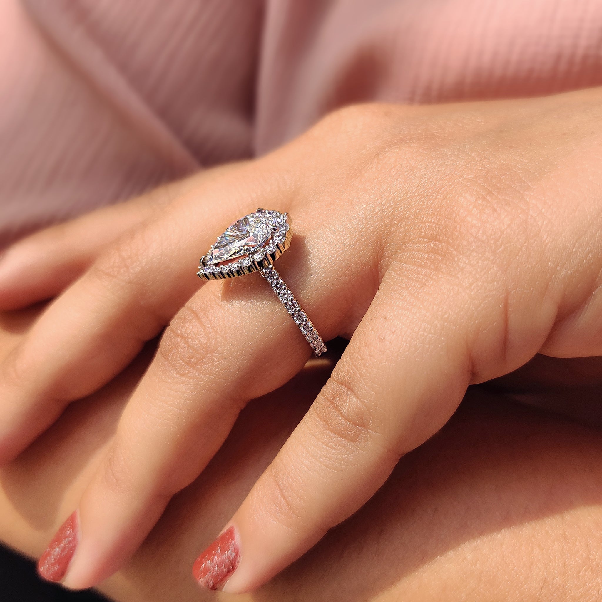 Pear Shaped Halo Engagement Ring In Round Cut Halo Style