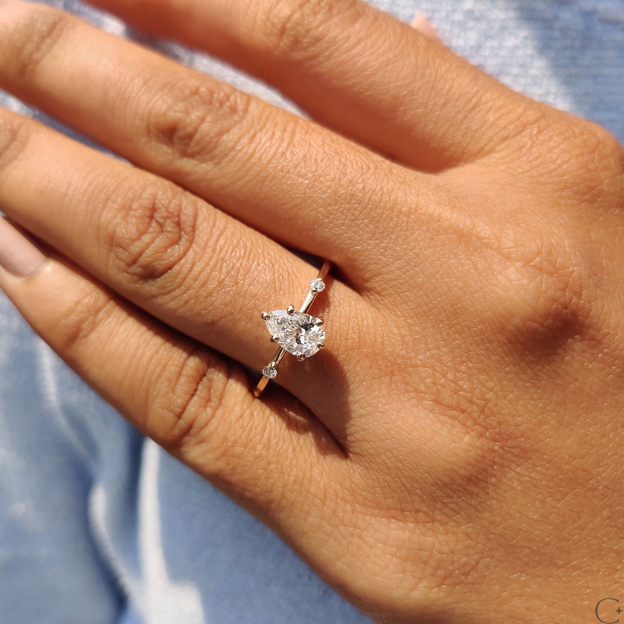 Pear Cut Diamond Ring With Distance Pave Setting