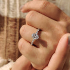 Oval Cut Engagement Ring With Round And Marquise Side Stones