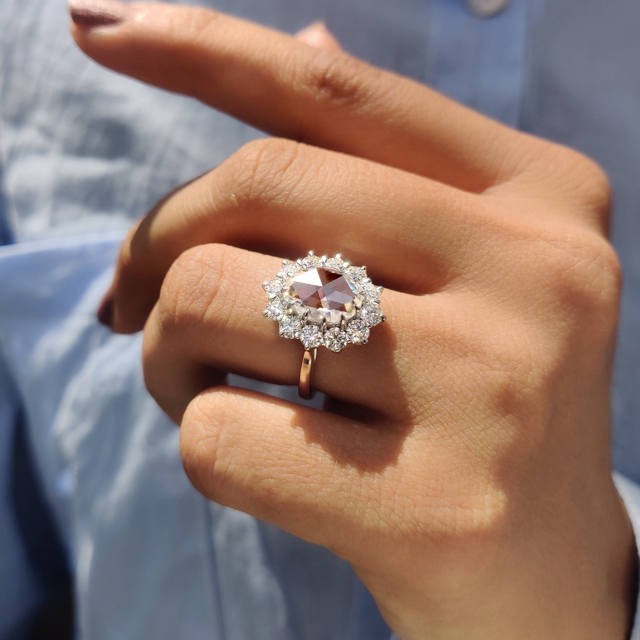 Oval Rose Cut Engagement Ring In Cluster Halo Style