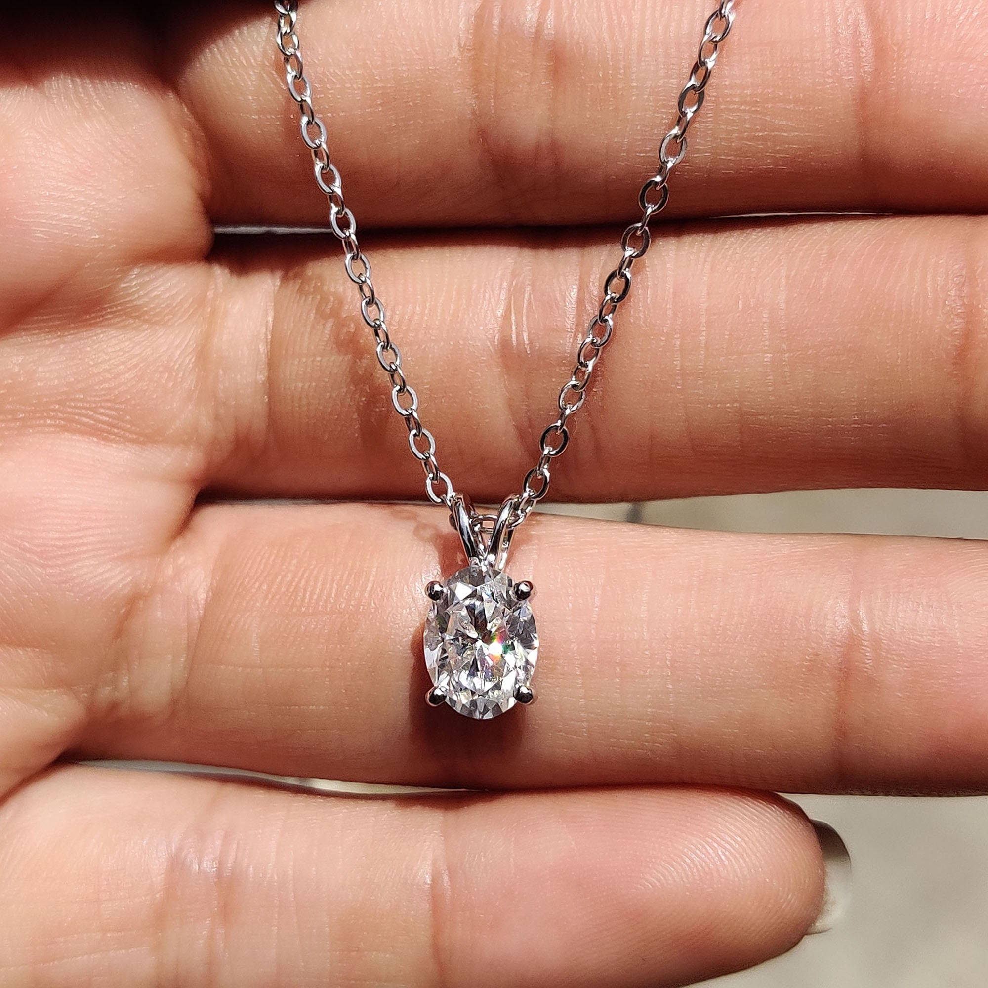 Oval Cut Moissanite Pendant In Solitaire Bunny Ear Bail