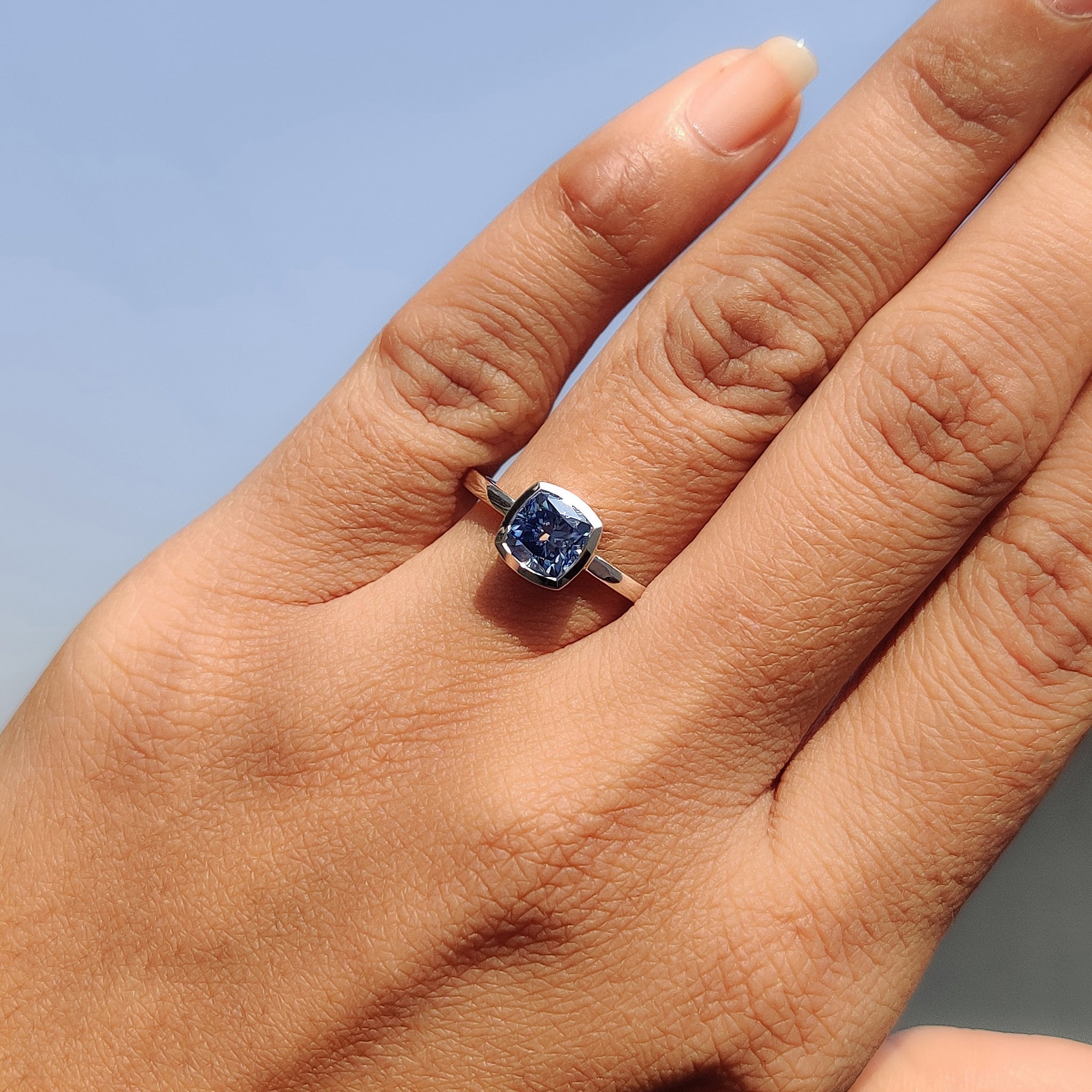 Cushion Solitaire Ring With Bezel Style